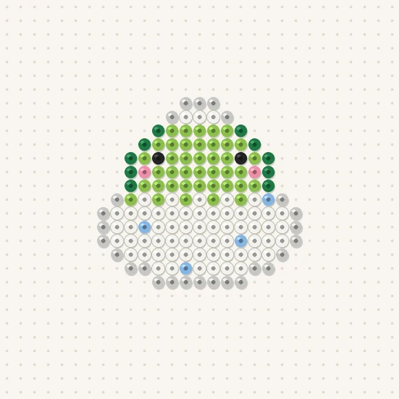 Modèle de perles à repasser bébé dinosaure dans son œuf sur une plaque de 29 × 29
