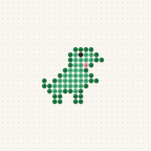 Modèle de perles à repasser mini t-rex sur une plaque de 29 × 29