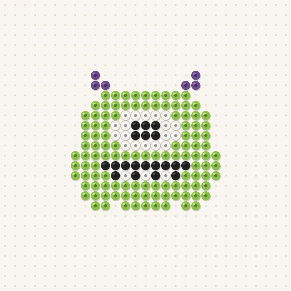 Modèle de perles à repasser petit monstre vert sur une plaque de 29 × 29